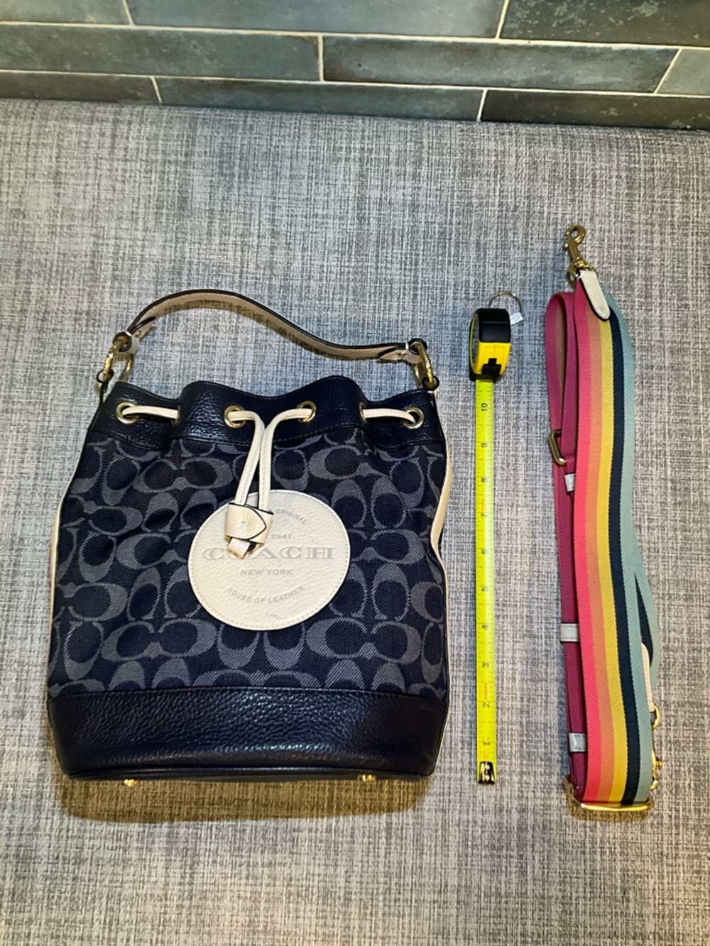 Coach Dempsey Navy Signature Bucket Bag with Tan Accents and Rainbow Strap - Picture 10 of 12